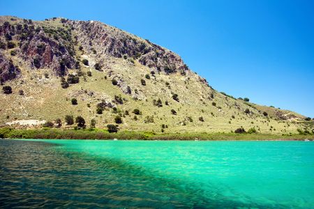 Lake Kournas on a backgroud mountain, Crete, Greeceの写真素材