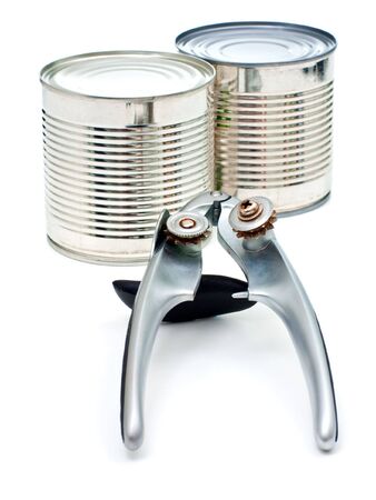 Metal cans and can-opener isolated on white backgroundの写真素材