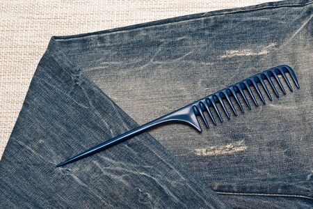 Blue comb on the jeans の写真素材