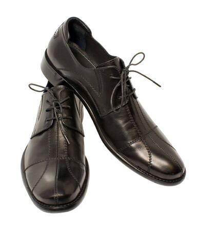 Stylish black shoes isolated on a white backgroundの写真素材