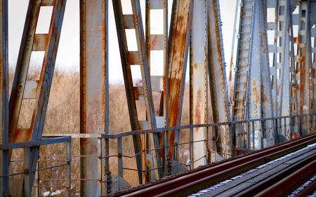 Rusty old bridge and abandoned railroad tracksの写真素材