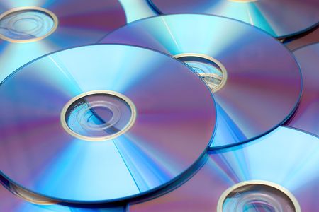 Lots of DVDs. Hi-tech iridescent backgroundの写真素材