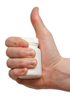 bottle with pills in hand isolatedの写真素材