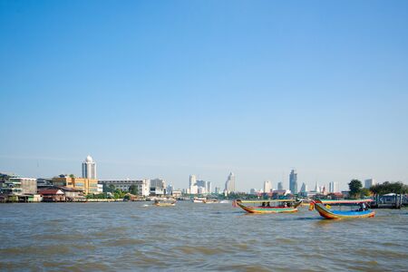 Boats on the Chao Phraya river in Bangkokの写真素材