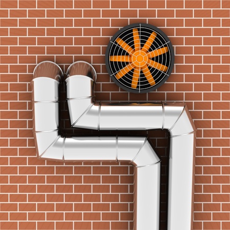 Metal pipes and ventilator on the brick wallの写真素材
