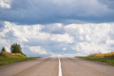 Empty road straight to the heavenの写真素材