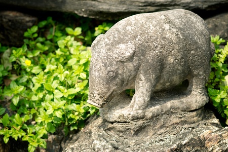 Stone statue of a pig in Grand palace, Bangkok, Thailandの写真素材