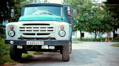 Bryansk, Russia - 18 July, 2011: Soviet truck ZIL-130 on the roadside. ZIL-130 is a Soviet/Russian truck designed and developed by ZIL, Moscow, Russia. Produced since 1962, mass produced since 1964. Was one of the most popular cargo trucks in the USSR andのeditorial素材