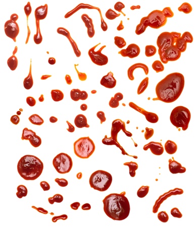 Drops of ketchup isolated on a white backgroundの写真素材