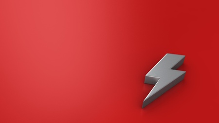 Metal lightning symbol on red background with copyspaceの写真素材