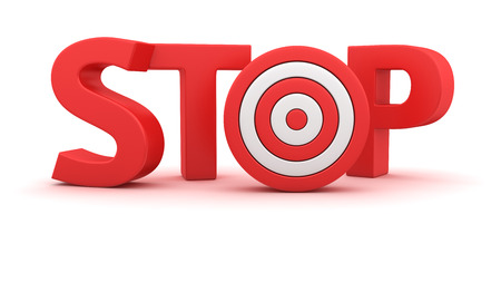Word Stop with small dartboard on white backgroundの写真素材