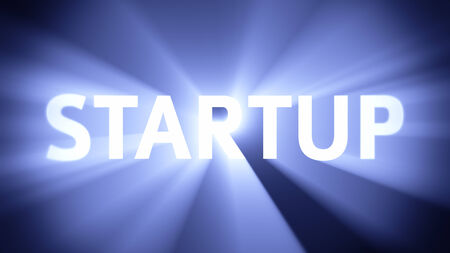 Radiant light from the word "STARTUP"の写真素材
