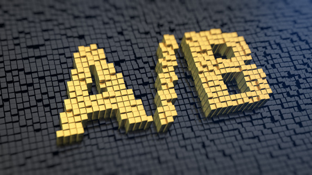 Symbols 'A/B' of the yellow square pixels on a black matrix background. Split tests concept, leads generation termin.の写真素材