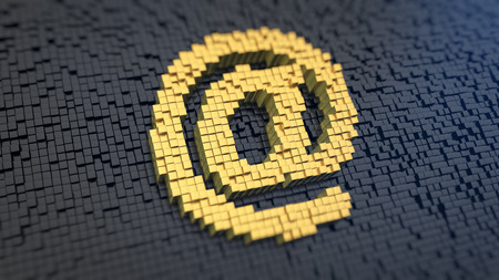 Sign \'at\' of the yellow square pixels on a black matrix background. の写真素材