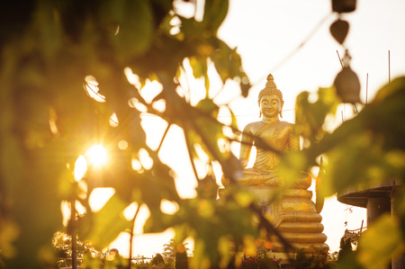 Statue of sitting Buddha in the temple of Thailandの写真素材