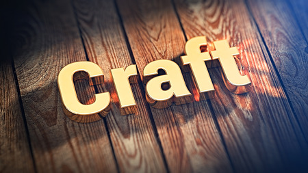 The word "Craft" is lined with gold letters on wooden planks. 3D illustration imageの写真素材
