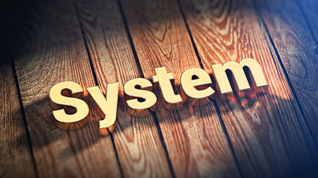System requirements. The word "System" is lined with gold letters on wooden planks. 3D illustration imageの写真素材