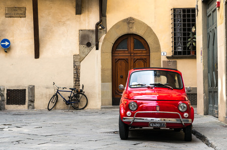 Florence, Italy - April 25, 2016. Vintage Fiat 500L parked on quite street in the old town of Florence.のeditorial素材