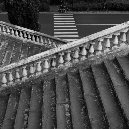 Old weathered baroque staircase to the palaceの写真素材