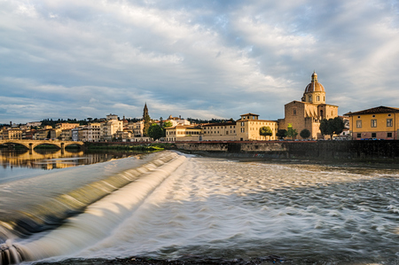 Santa Rosa dam via Arno river and San Frediano church in Florence, Italyの写真素材