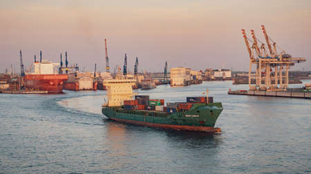 Hamburg, Germany, 19 April 2018: Cargoship in the port of Hamburg on Elbe river, Germanyのeditorial素材