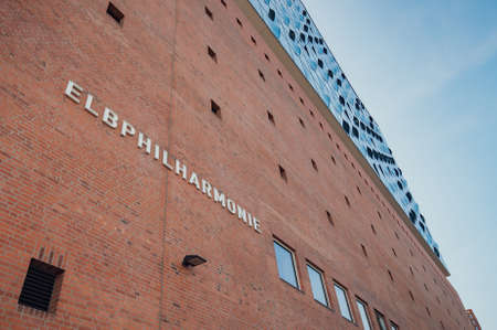 Hamburg, Germany, 18 April 2018: White letters "Elbphilharmonie" on the red brick facade of famous Elbe Philharmonic Hallのeditorial素材