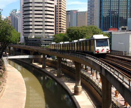 mass transport system for City of Kuala Lumpur showing  train leaving a station