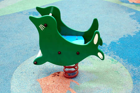 rocking horse in a parkの写真素材