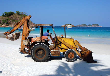 back hoe waiting to transport lugagein  Pulua Redang, Malaysiaの写真素材