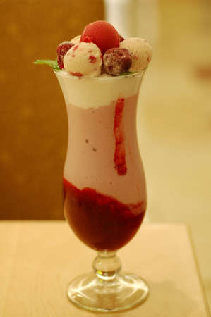 icecream with mint leaves and cream
