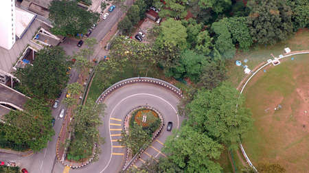 Road leading to mountain showing hairpin curveの写真素材