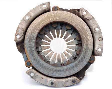 clutch plate just removed from a car showing wear out and dust springsの写真素材