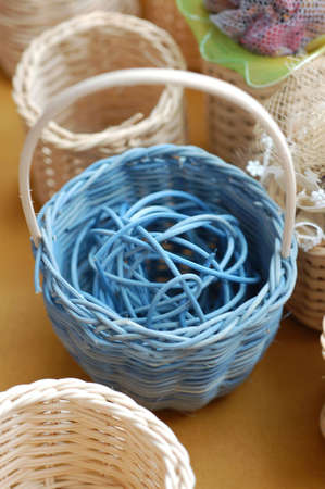 blue mini basket with ball inside showing textureの写真素材