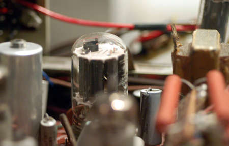 electronic board showing old vacuum valves and capacitorsの写真素材