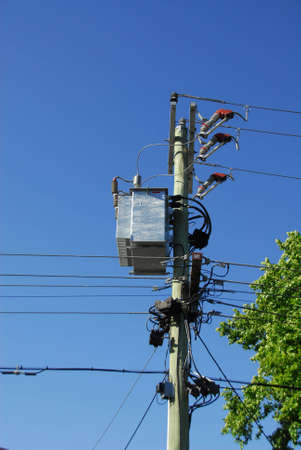 Power supply transformer with blue sky as backgroundの写真素材