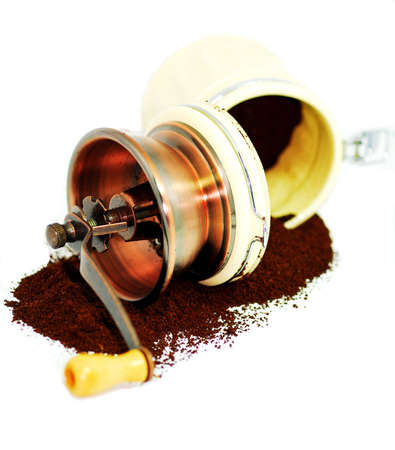 hand coffee grinder with grounded powderの写真素材