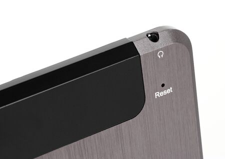 Tablet black silver metal on white background cutout isolated without screen sideの写真素材