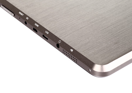 Tablet black silver metal on white background cutout isolated without screen sideの写真素材