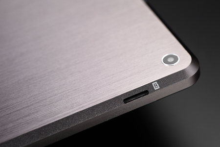 Tablet black silver metal on black background with shadow cutout isolated without screen sideの写真素材