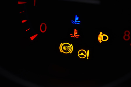 ABS light in car.Car dashboard in closeup