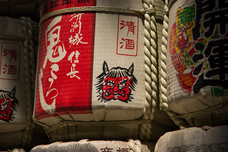 TOKYO JAPAN July 27, 2016: Japanese Sake barrels stacked at the entrance of Meiji shrine at Tokyo, Japanのeditorial素材