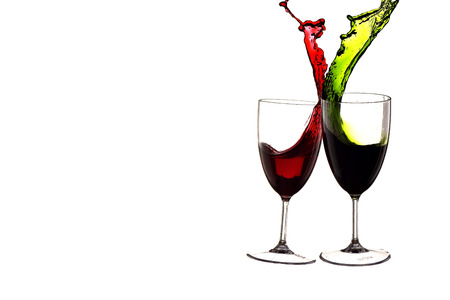 Water color splashing in glass wine isolated background,water splashの写真素材