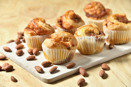 Almond Danish Cupcakes on wooden background.の写真素材