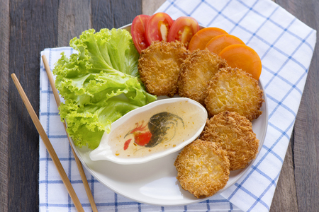 Shrimp Cakes on wooden table,Thai food.の写真素材