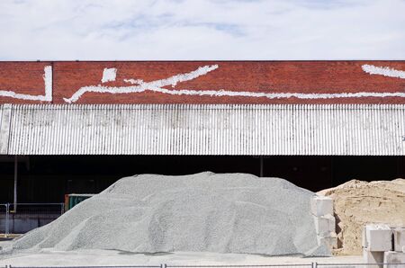 Minimal view of a building site with gravel, sand and stones
