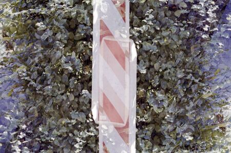 Mirrored, double exposure analogue photography of a red and white striped road signの写真素材