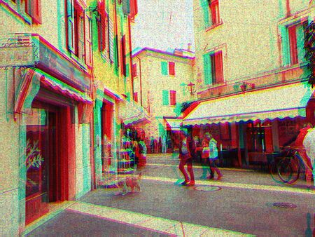Photograph of pedestrians passing on a footpath, edited with video fx.の写真素材