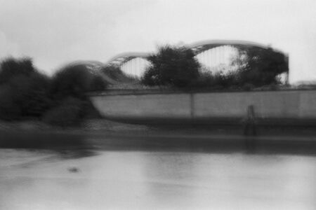 Blurred black and white analogue exposure of an industrial landscape.の写真素材