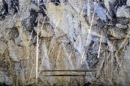 Close up photography of paint splatter on a weathered metal plateの写真素材