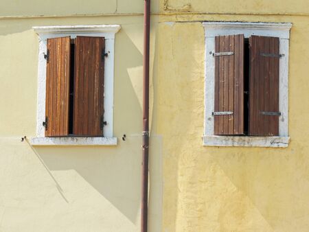 Abstract close up color photography of a weathered  house wall.の写真素材